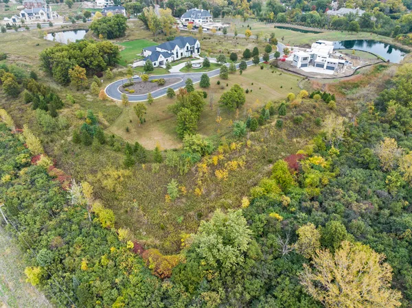 an aerial view of residential house with outdoor space