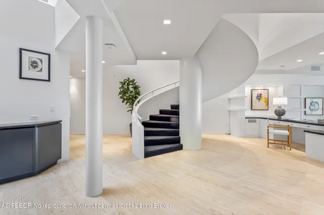 a view of kitchen with furniture and staircase
