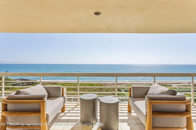 a view of roof with lawn chairs and wooden floor