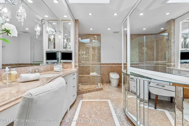 a bathroom with a sink and a large mirror