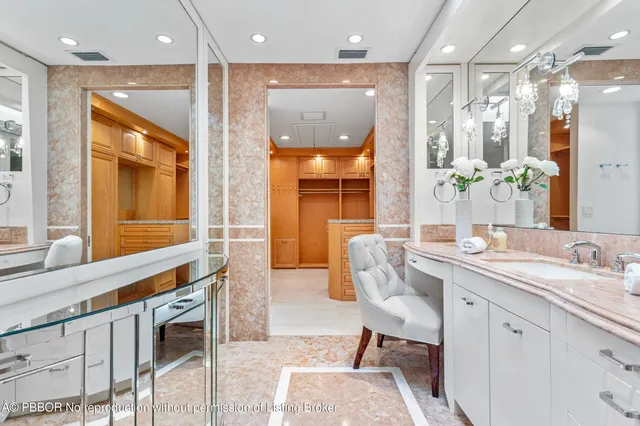 a living room with furniture a fireplace and a table