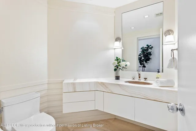 an aerial view of residential houses with outdoor space and river