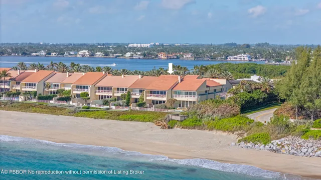 an aerial view of residential building and lake view