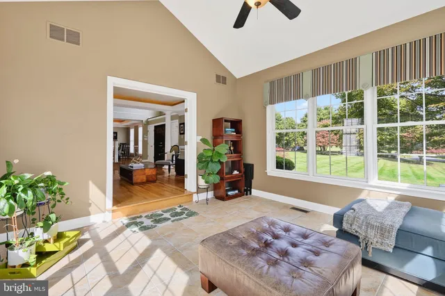 a view of a house with a yard and garage