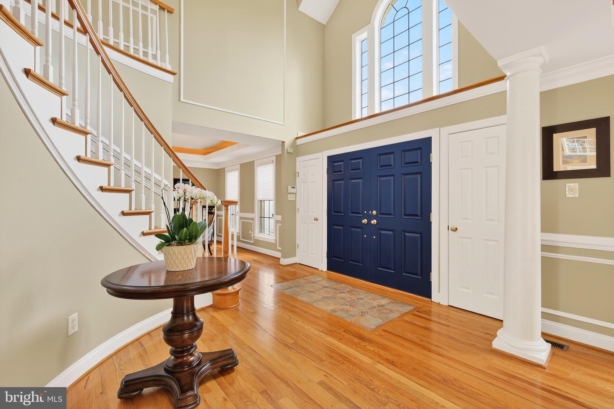 7221 Preservation Court Fulton, MD 20759 - Photo 3 of 5 a view of entryway with wooden floor and stairs