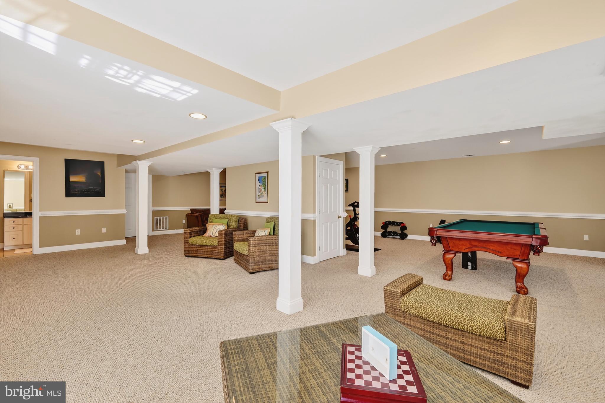 7221 Preservation Court Fulton, MD 20759 - Photo 45 of 69 a living room with furniture and a flat screen tv