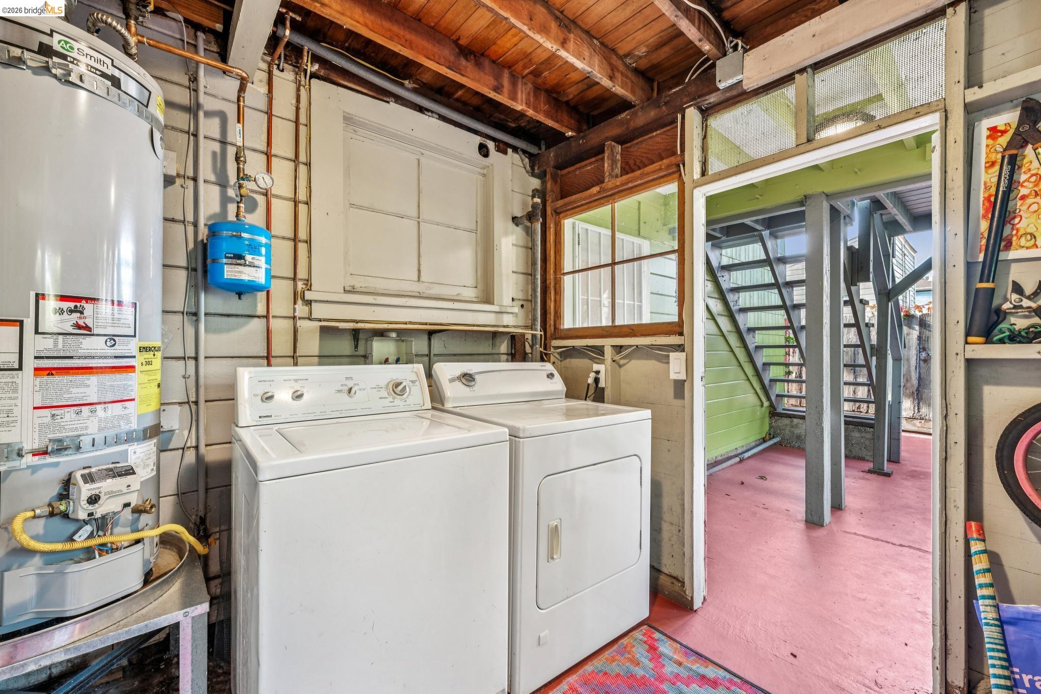 836 20th Street Oakland, CA 94607 - Photo 38 of 54 Laundry shed with washer/dryer, water heater and room for storage