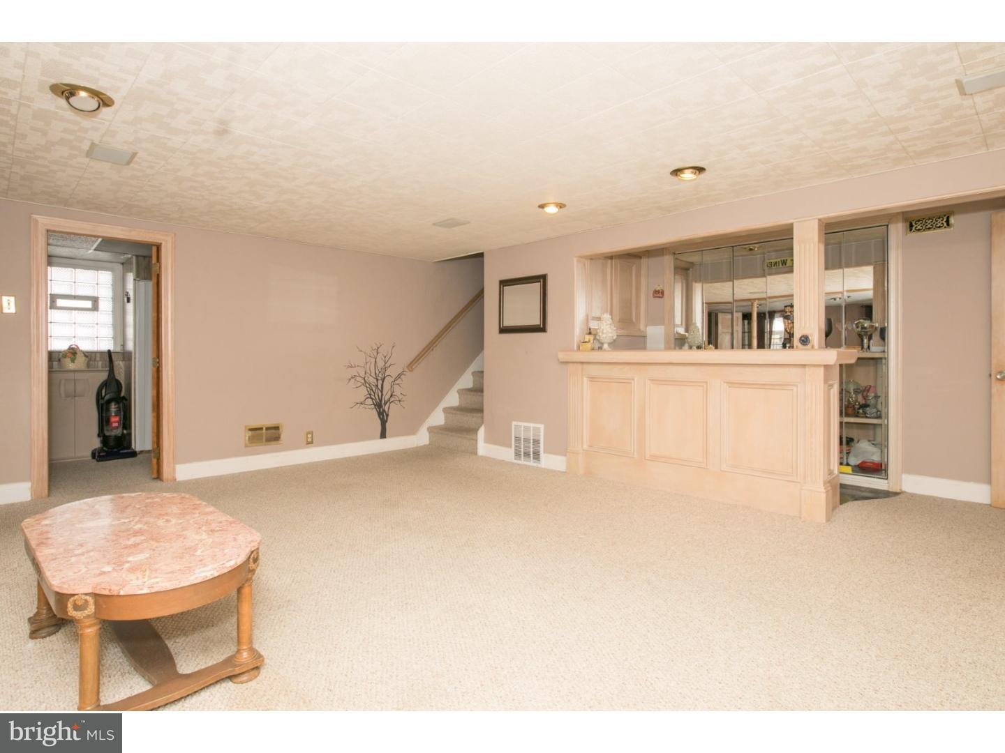 34 South Bell Road Bellmawr, NJ 08031 - Photo 12 of 25 a view of a kitchen with furniture and wooden floor