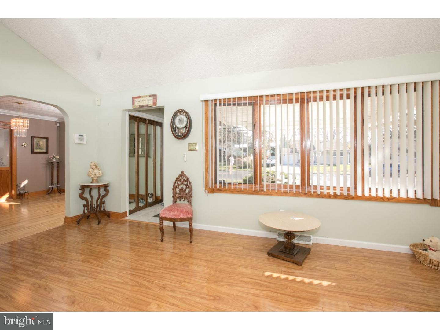 34 South Bell Road Bellmawr, NJ 08031 - Photo 14 of 25 a living room with furniture and a large window