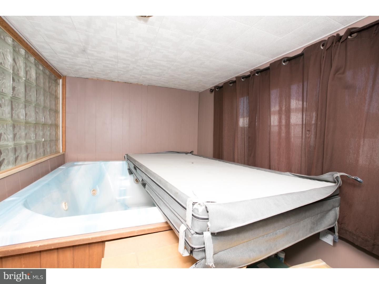 34 South Bell Road Bellmawr, NJ 08031 - Photo 24 of 25 a room with a bed and a window
