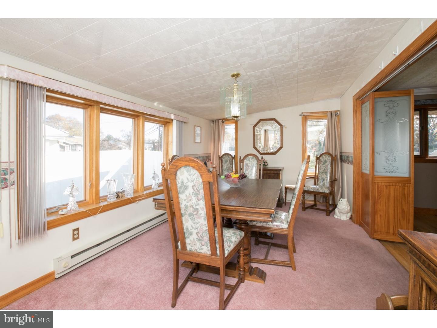 34 South Bell Road Bellmawr, NJ 08031 - Photo 5 of 25 a living room with furniture and a large window