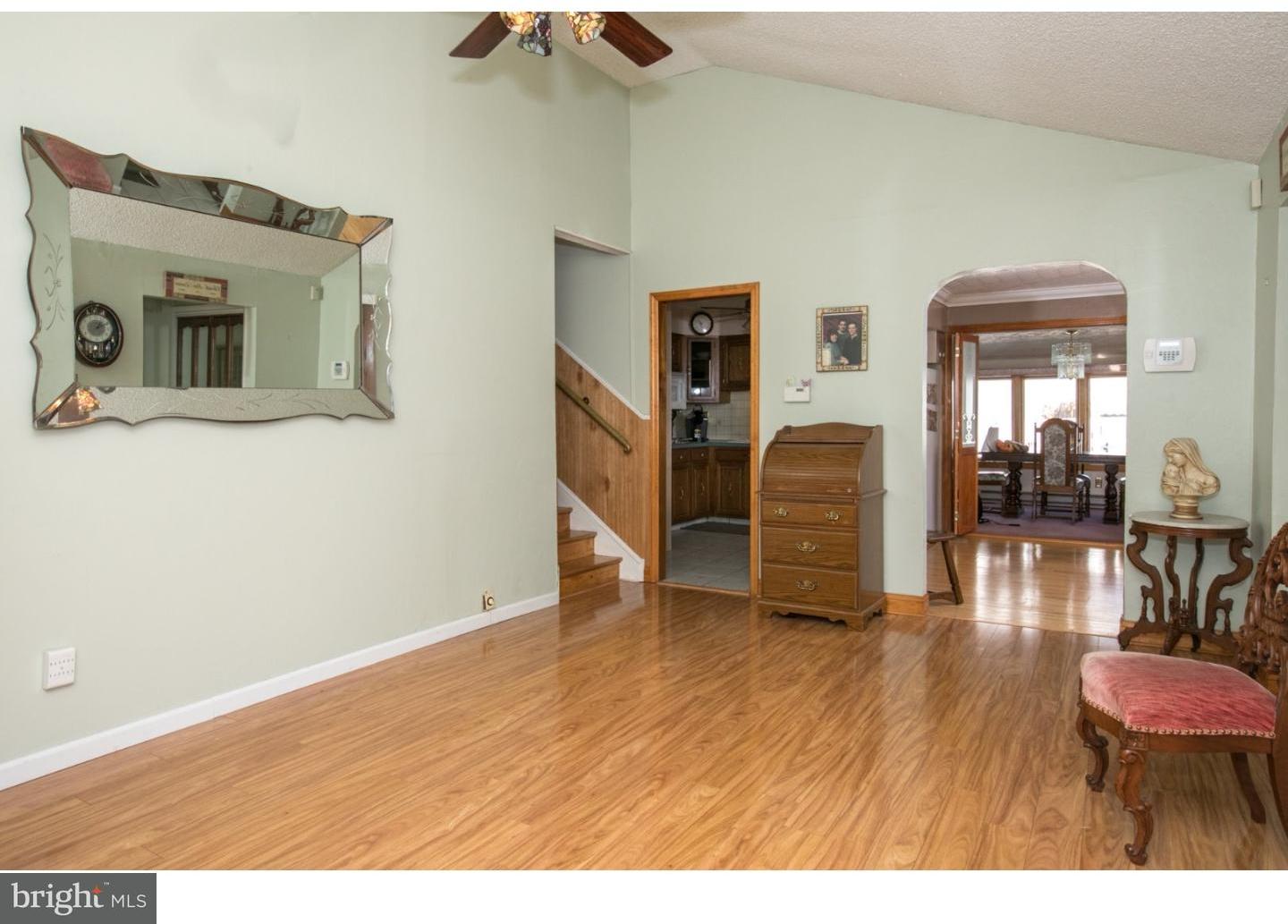 34 South Bell Road Bellmawr, NJ 08031 - Photo 7 of 25 a living room with furniture and a wooden floor