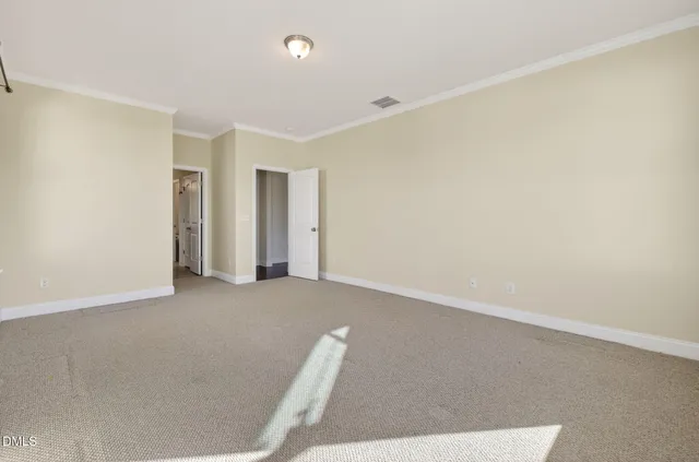 a bathroom with a shower sink and mirror