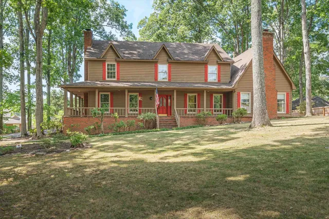 a view of a house with a swimming pool