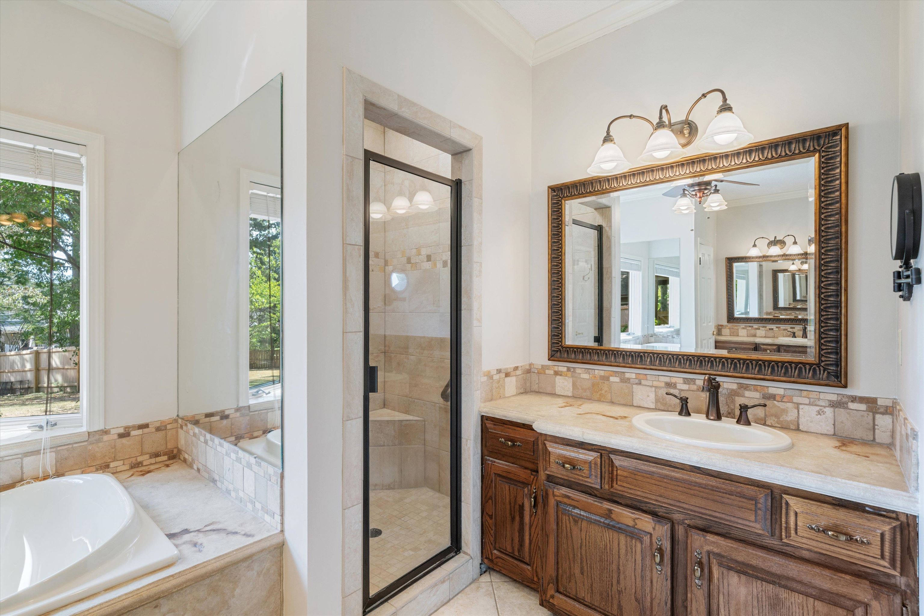 4309 Garner Place Bartlett, TN 38135 - Photo 16 of 40 a bathroom with a granite countertop sink mirror and double