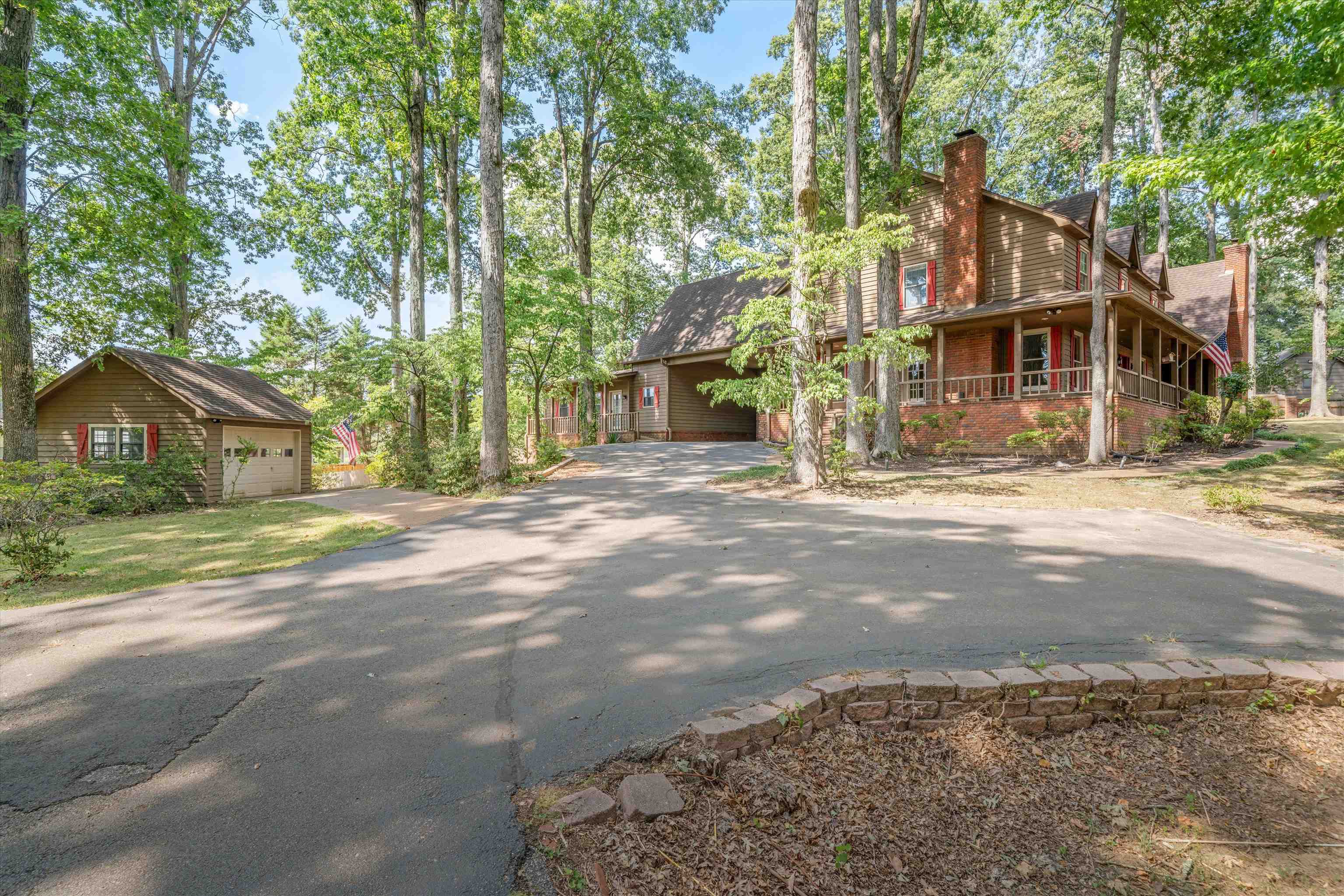 4309 Garner Place Bartlett, TN 38135 - Photo 2 of 40 a front view of a house with a yard