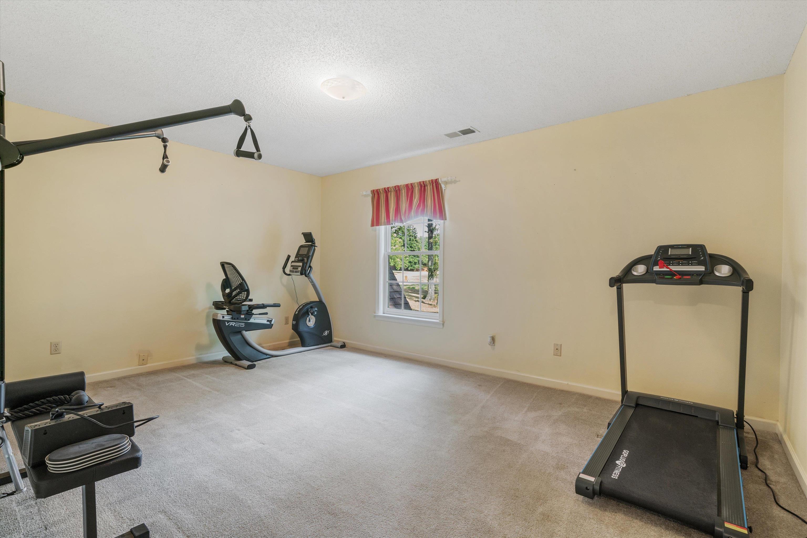 4309 Garner Place Bartlett, TN 38135 - Photo 24 of 40 a view of a room with gym equipment
