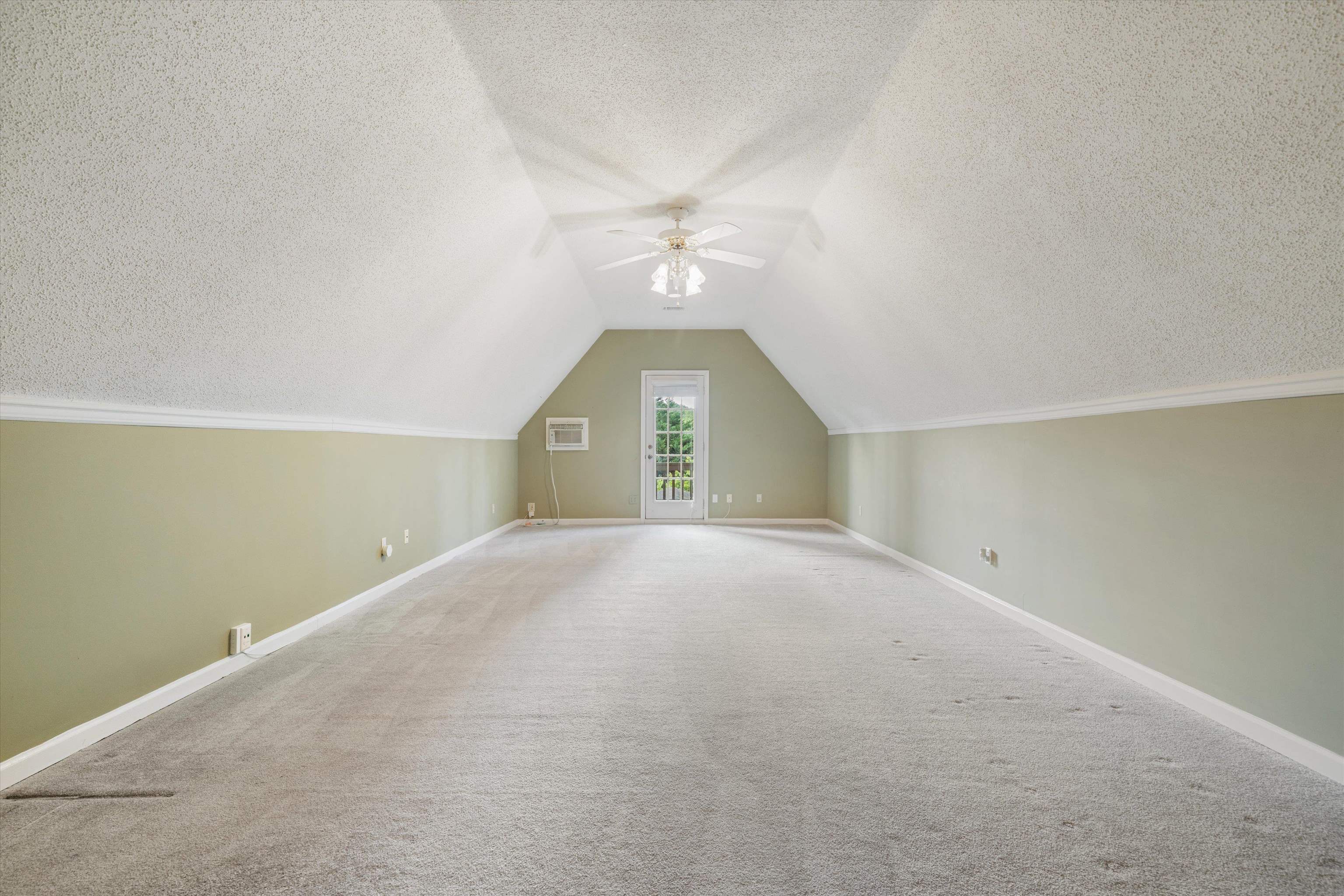 4309 Garner Place Bartlett, TN 38135 - Photo 25 of 40 an empty room with a ceiling fan and window