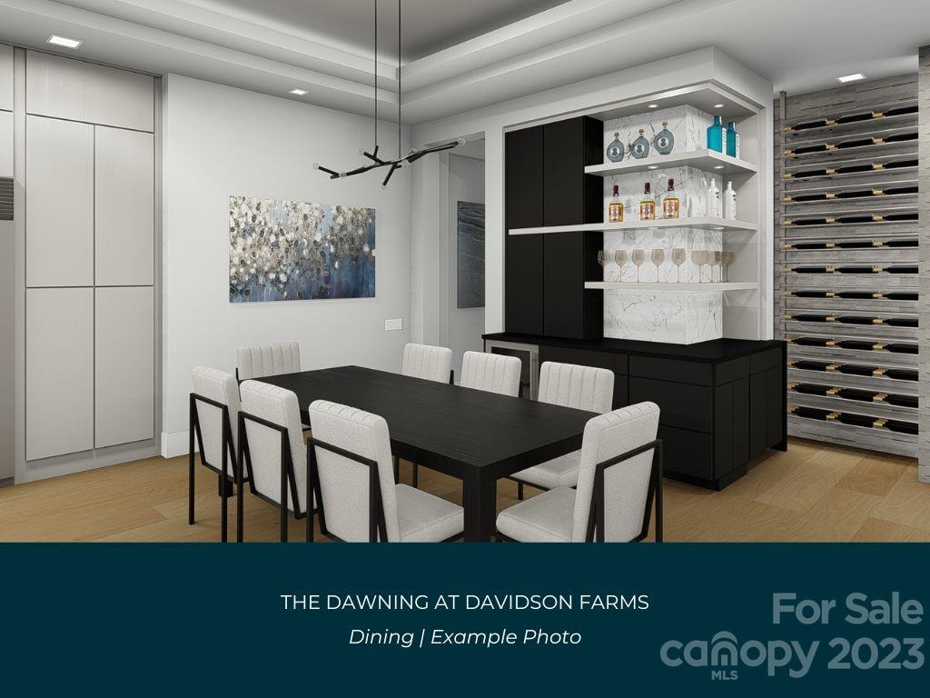 21119 Vandrake Circle, Unit 7 Davidson, NC 28036 - Photo 11 of 33 a view of a dining room with furniture and wooden floor