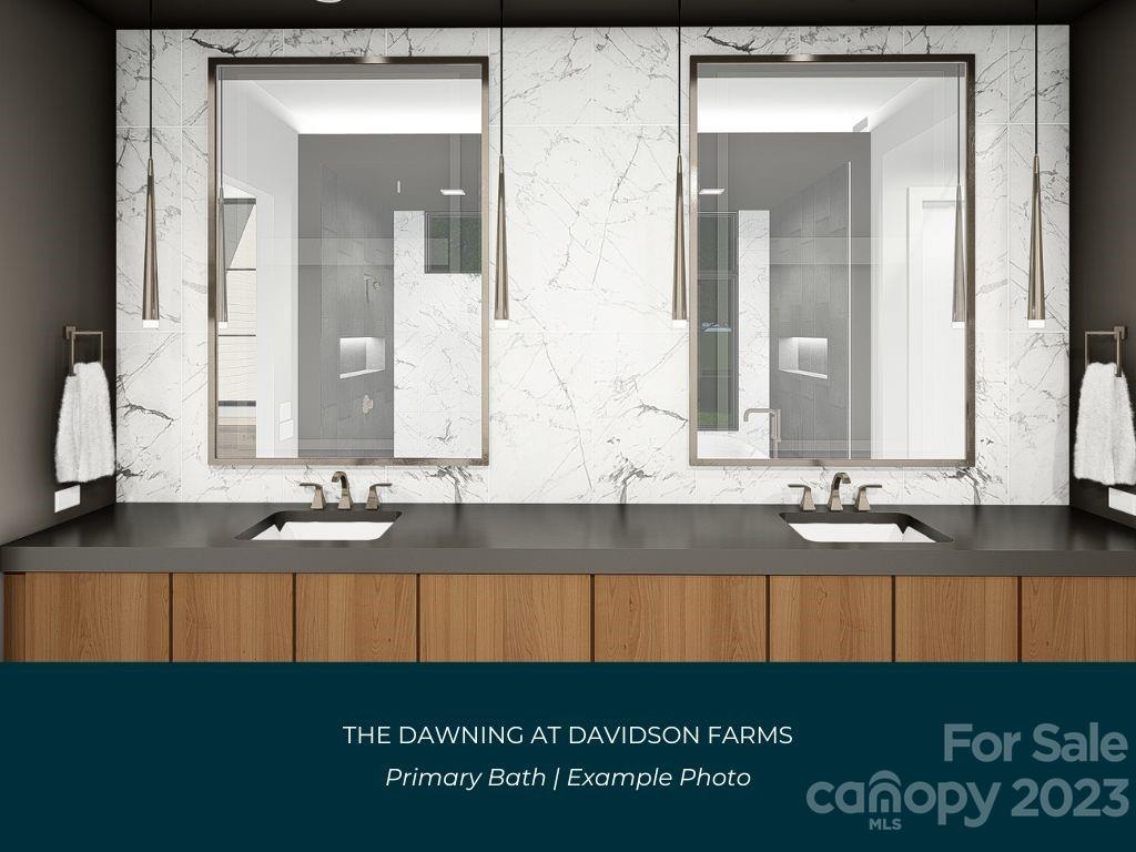 21119 Vandrake Circle, Unit 7 Davidson, NC 28036 - Photo 14 of 33 a bathroom with a sink and a mirror