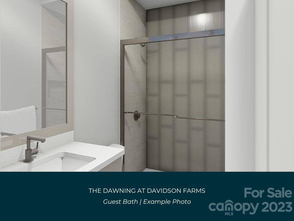 21119 Vandrake Circle, Unit 7 Davidson, NC 28036 - Photo 17 of 33 a bathroom with a sink and a mirror