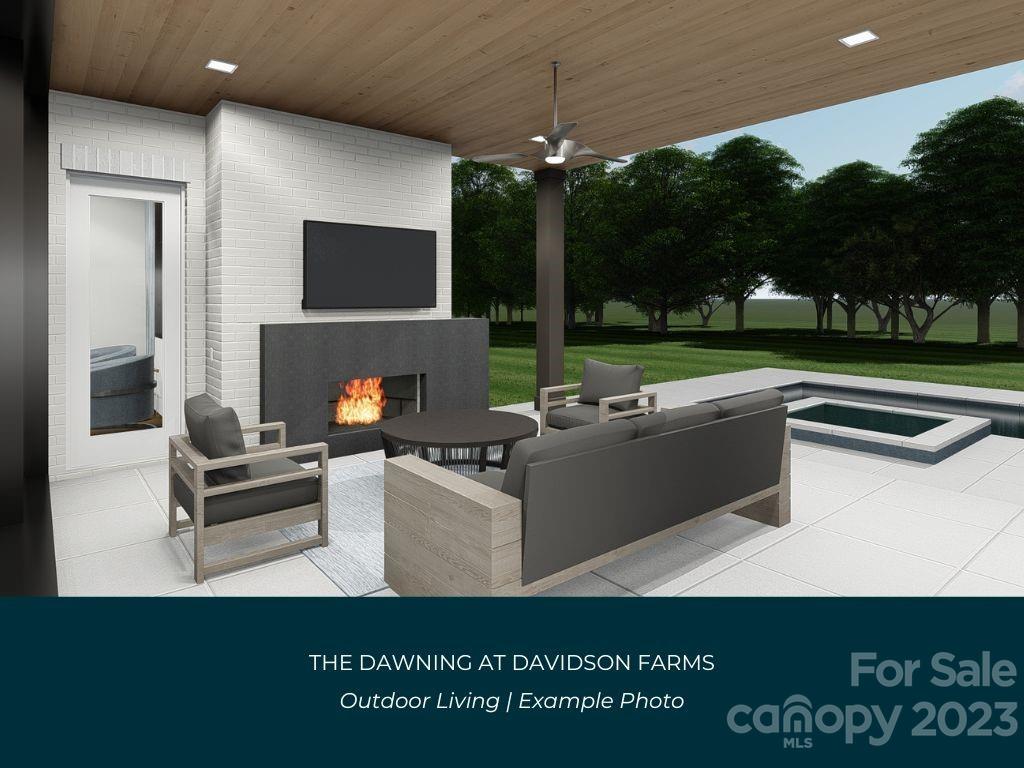 21119 Vandrake Circle, Unit 7 Davidson, NC 28036 - Photo 18 of 33 a view of a living room and kitchen