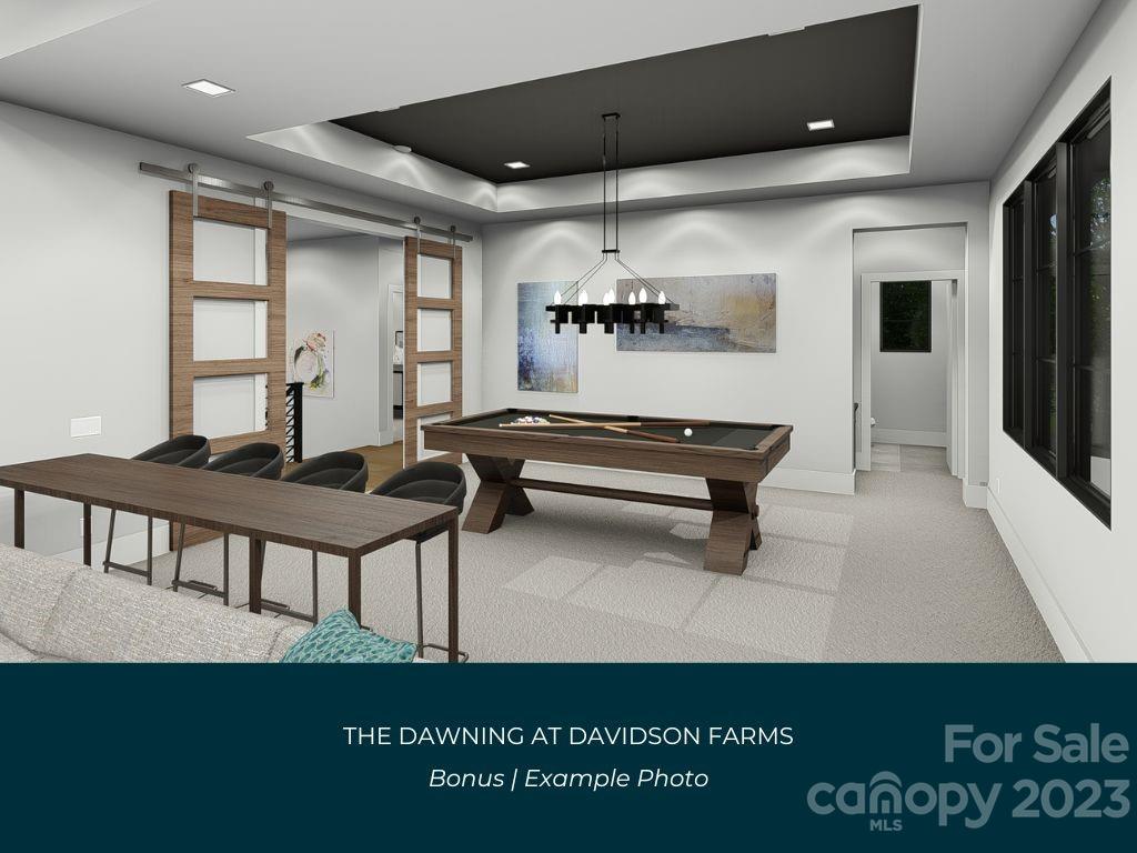 21119 Vandrake Circle, Unit 7 Davidson, NC 28036 - Photo 22 of 33 a living room with furniture