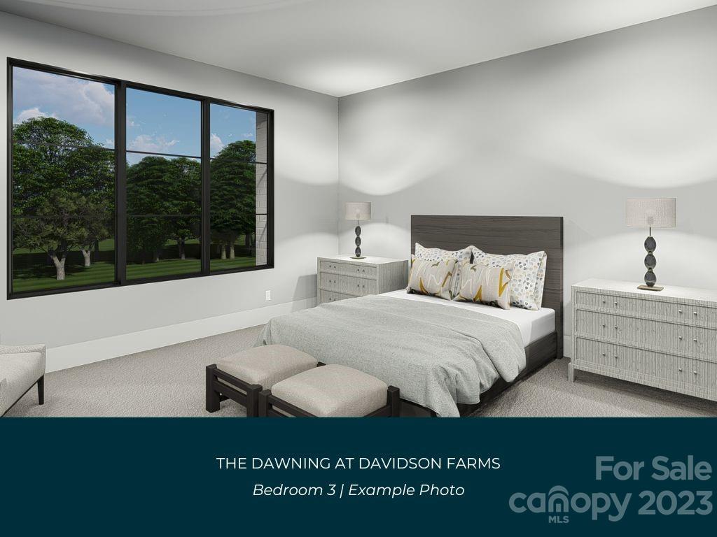 21119 Vandrake Circle, Unit 7 Davidson, NC 28036 - Photo 25 of 33 a bedroom with a bed and window