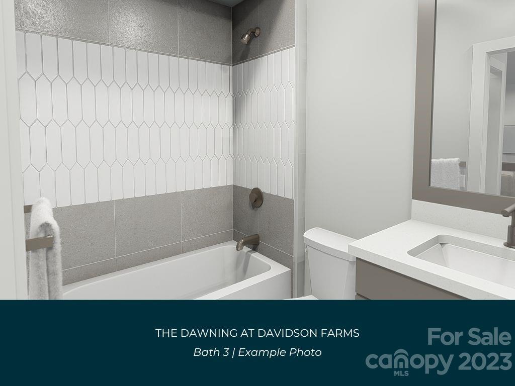 21119 Vandrake Circle, Unit 7 Davidson, NC 28036 - Photo 26 of 33 a bathroom with a bathtub and a sink