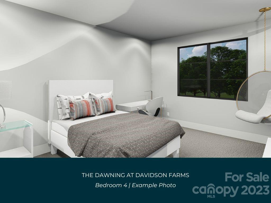 21119 Vandrake Circle, Unit 7 Davidson, NC 28036 - Photo 27 of 33 a bedroom with a bed and window