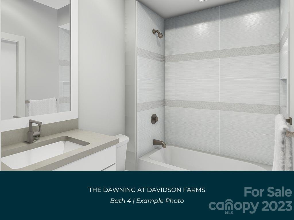 21119 Vandrake Circle, Unit 7 Davidson, NC 28036 - Photo 28 of 33 a bathroom with a sink a mirror and a shower