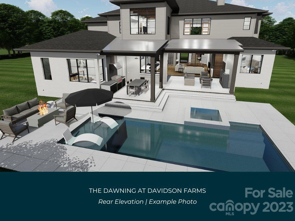 21119 Vandrake Circle, Unit 7 Davidson, NC 28036 - Photo 3 of 33 a view of a house with backyard porch and sitting area