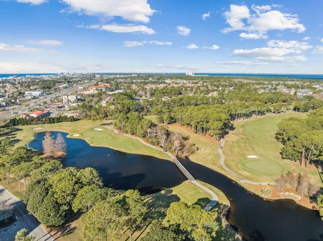 a view of a lake with a yard