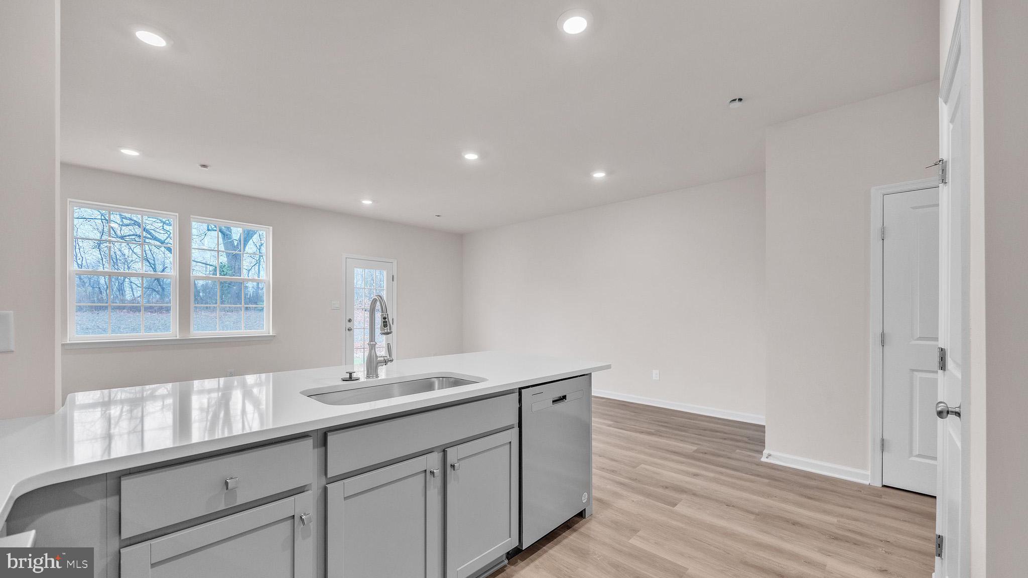 29 Alexander Way Westampton, NJ 08060 - Photo 4 of 14 a bathroom with a double vanity sink and a window