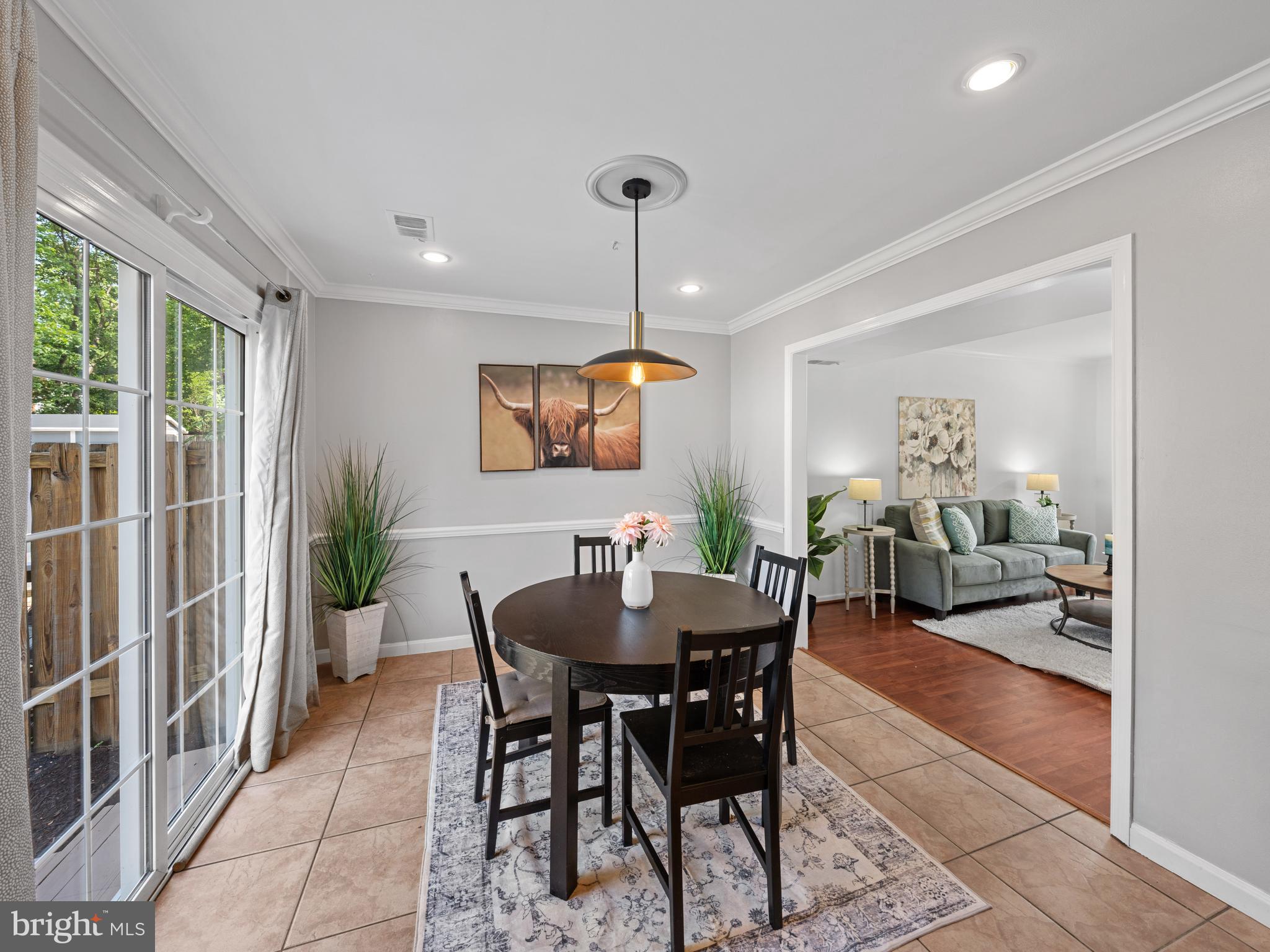 8448 Kitchener Drive Springfield, VA 22153 - Photo 11 of 32 a dining room with furniture and window