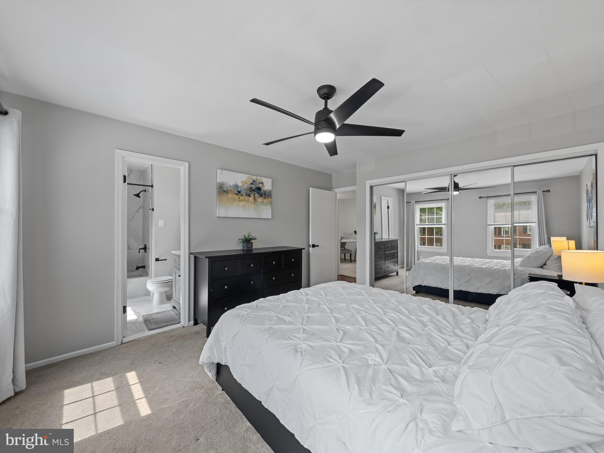 8448 Kitchener Drive Springfield, VA 22153 - Photo 14 of 32 a bed room with a bed and a tv