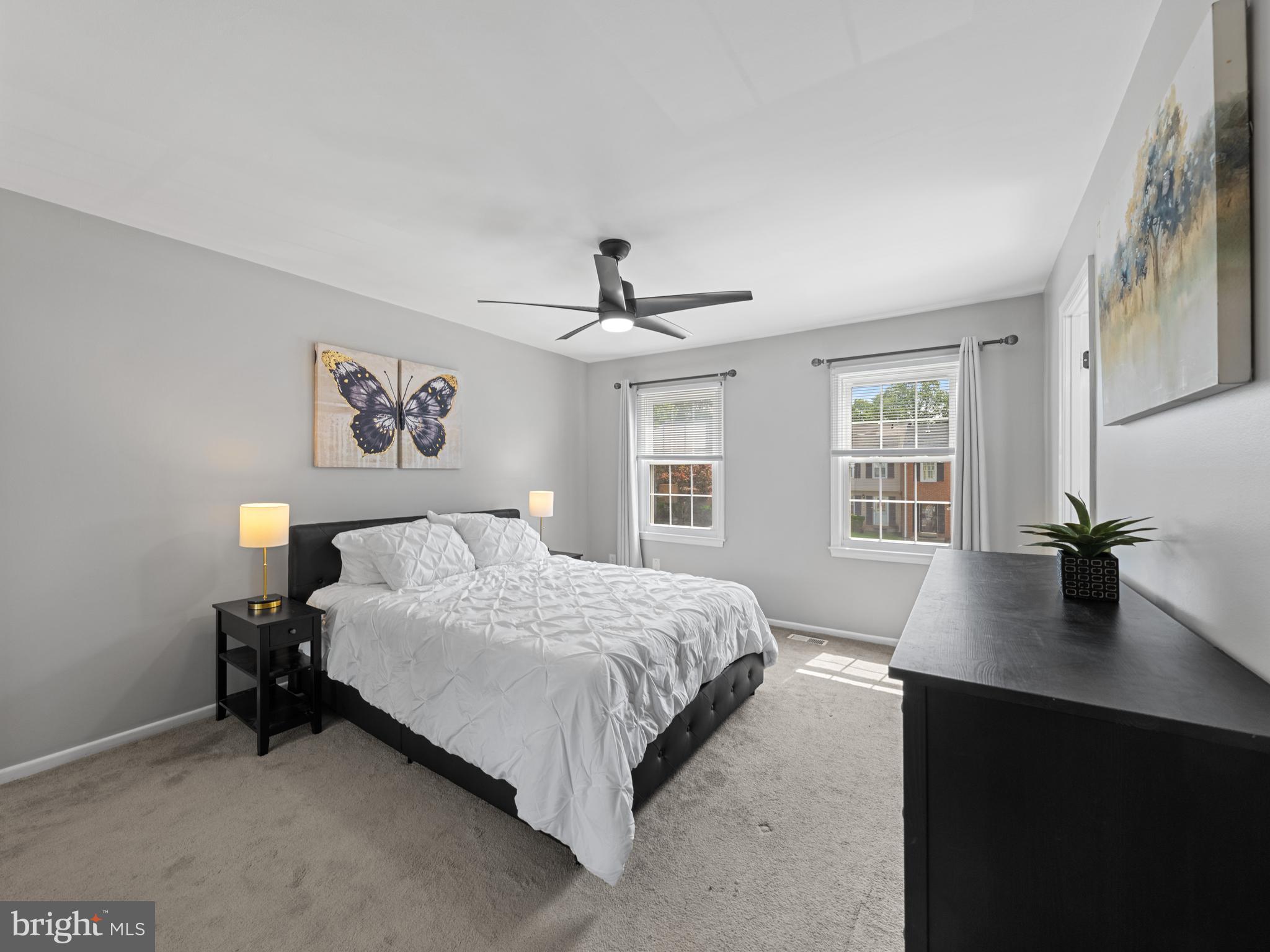 8448 Kitchener Drive Springfield, VA 22153 - Photo 15 of 32 a bedroom with a bed and a large window