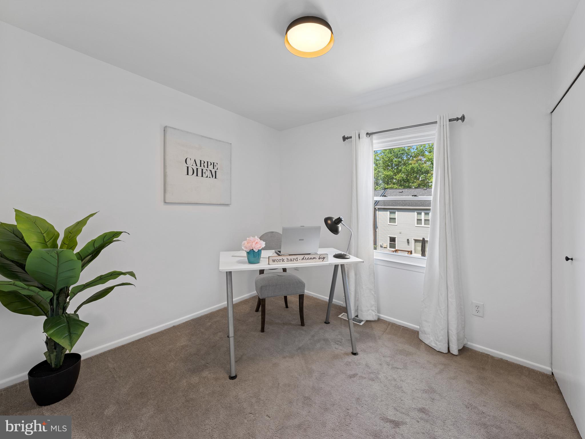 8448 Kitchener Drive Springfield, VA 22153 - Photo 19 of 32 a view of a workspace with a window