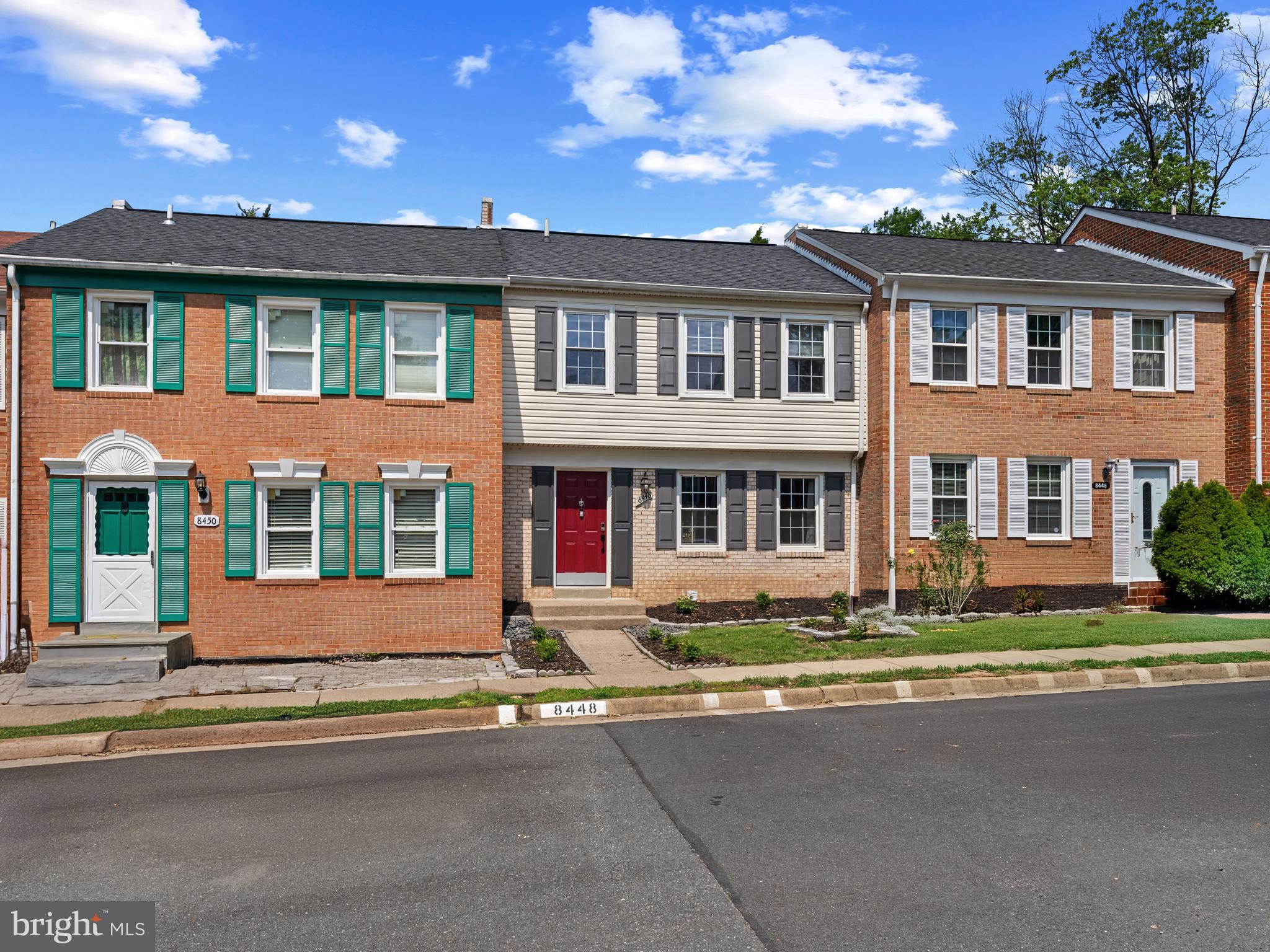 8448 Kitchener Drive Springfield, VA 22153 - Photo 25 of 32 front view of a house with a yard