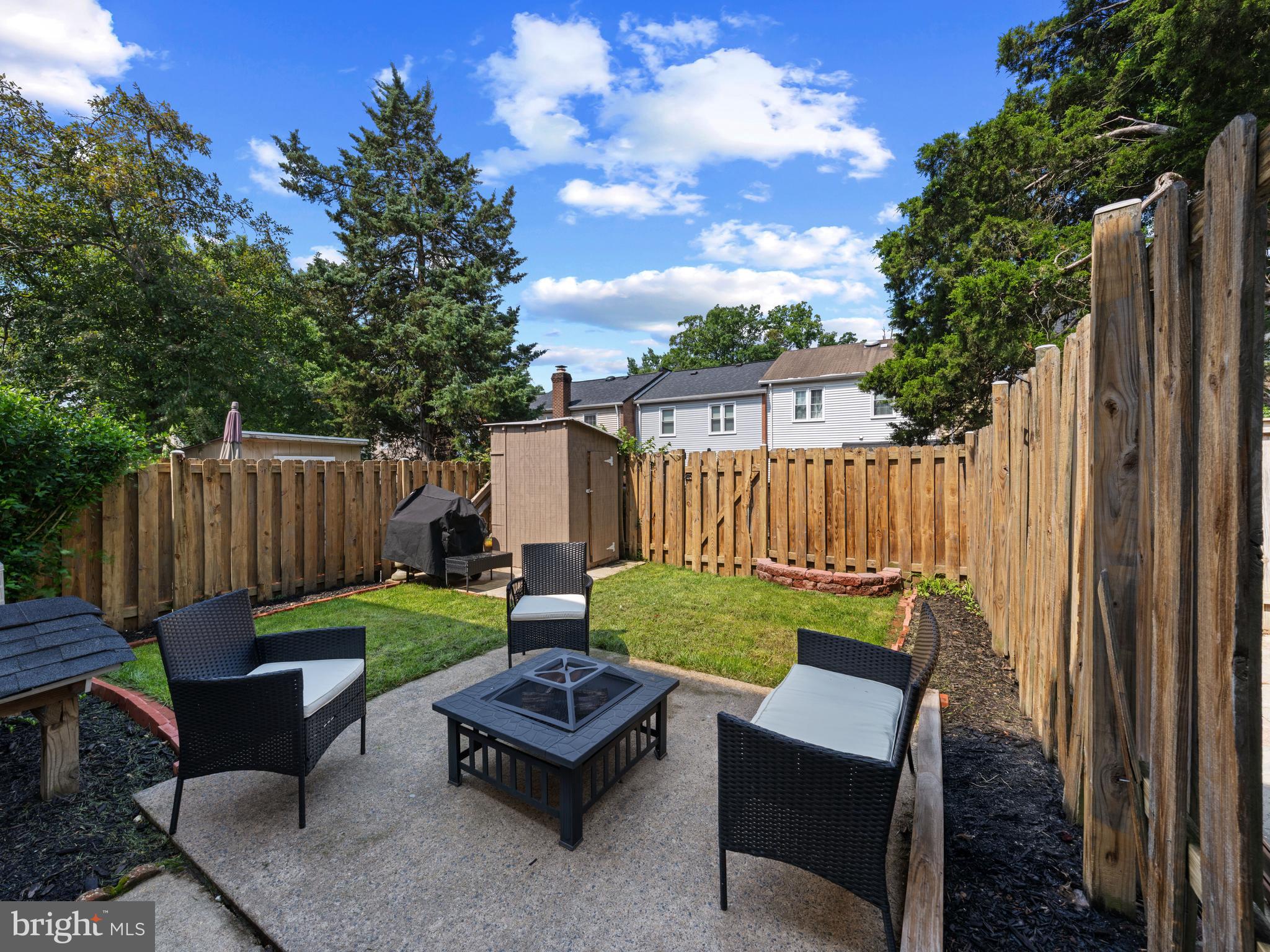 8448 Kitchener Drive Springfield, VA 22153 - Photo 27 of 32 a view of a backyard with furniture
