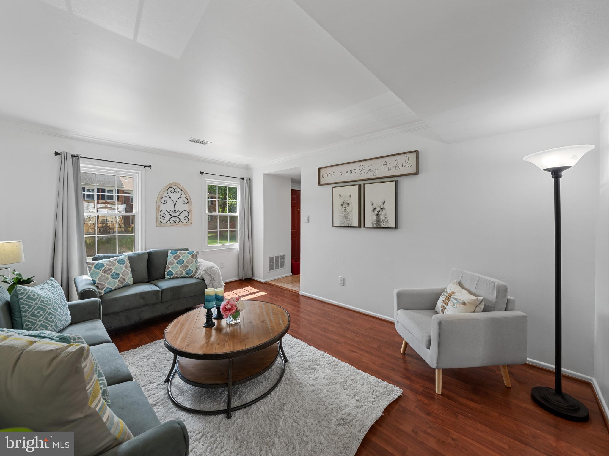 8448 Kitchener Drive Springfield, VA 22153 - Photo 6 of 32 a living room with furniture and a large window