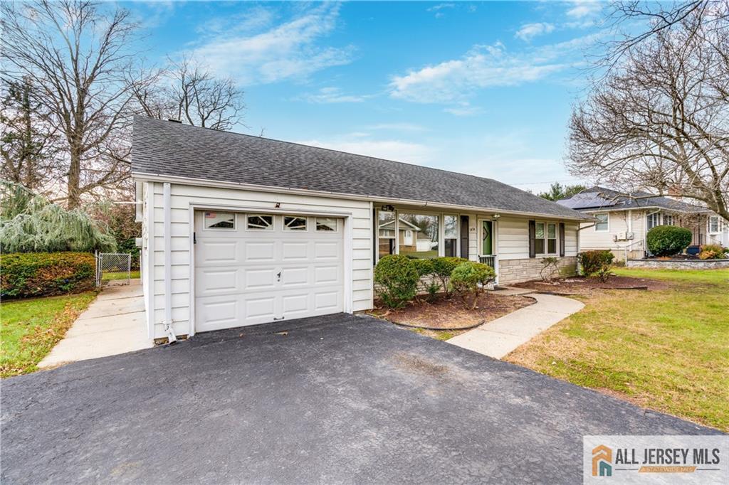 1474 Huron Road North Brunswick, NJ 08902 - Photo 15 of 16 a front view of a house with garden