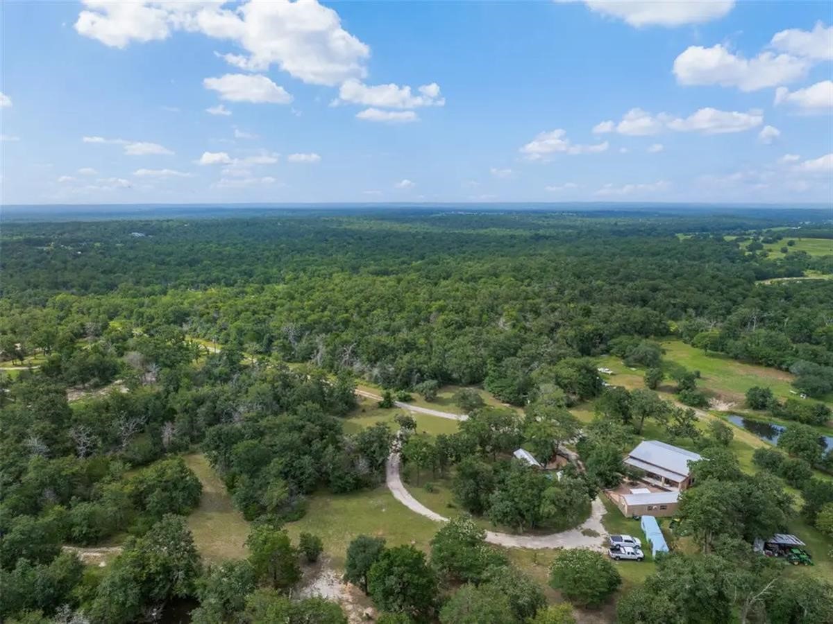 320 Oak Forest Road Somerville, TX 77879 - Photo 2 of 7 a view of a big yard with lots of green space