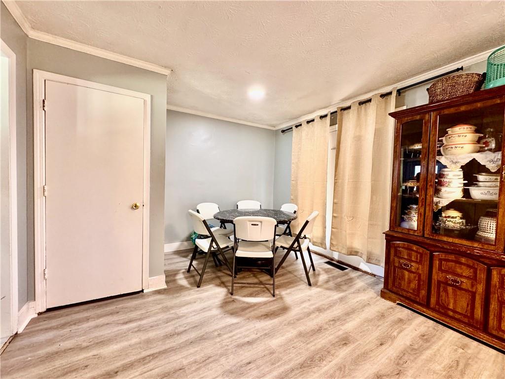 1825 North Road Snellville, GA 30078 - Photo 11 of 43 a living room with furniture and a window
