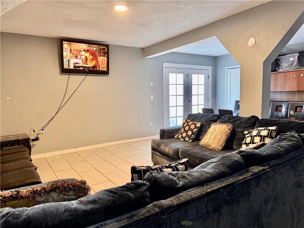 1825 North Road Snellville, GA 30078 - Photo 13 of 43 a living room with furniture and a flat screen tv