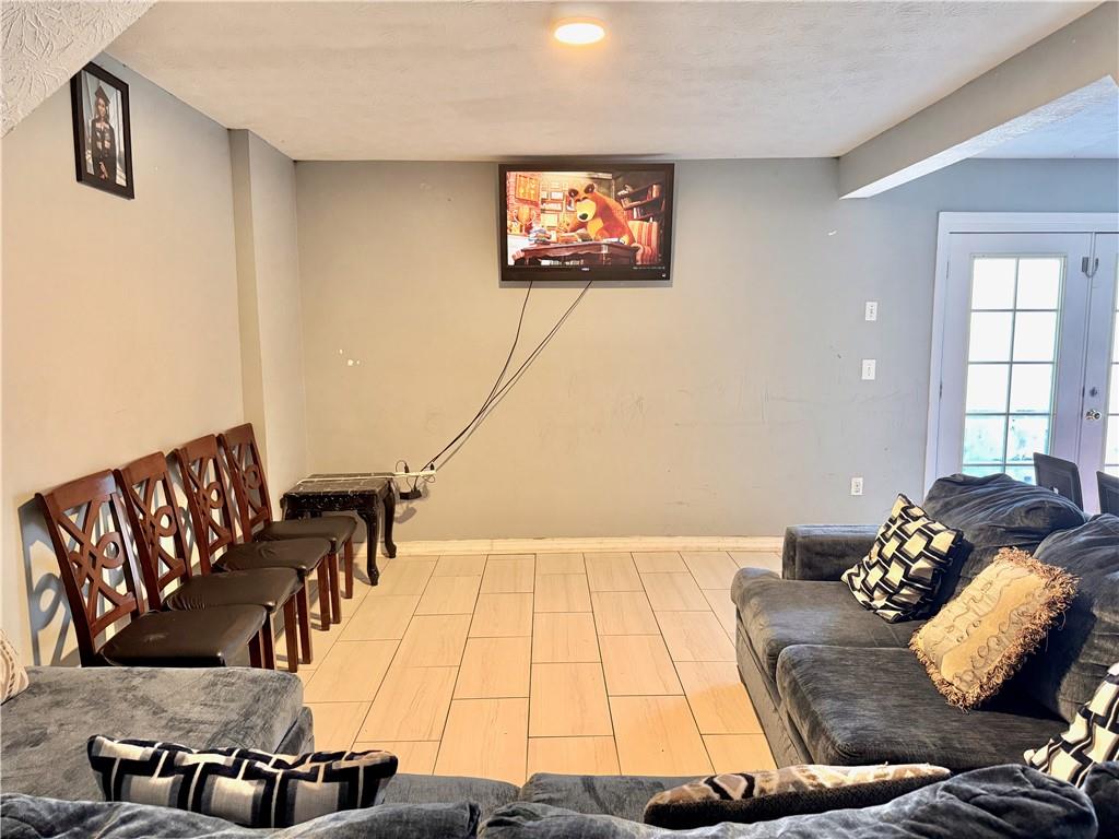1825 North Road Snellville, GA 30078 - Photo 14 of 43 a view of a living room and dining room