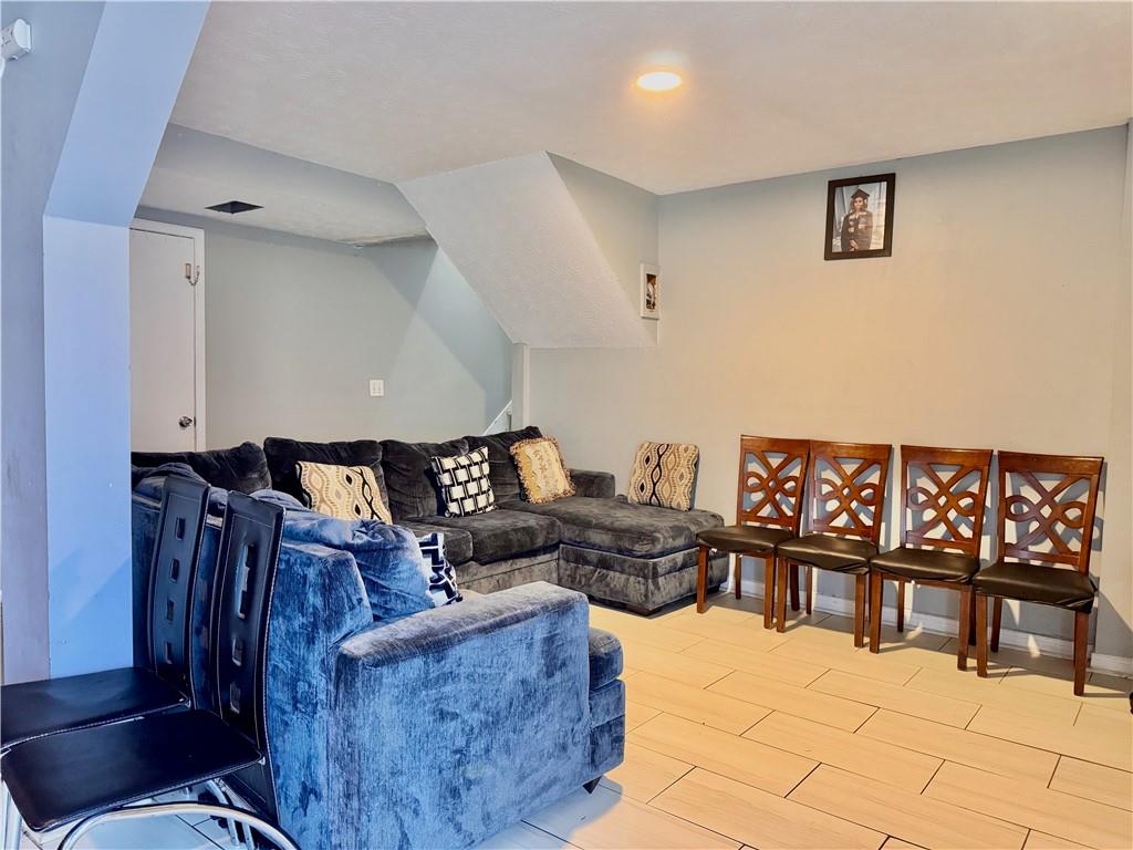 1825 North Road Snellville, GA 30078 - Photo 16 of 43 a living room with furniture