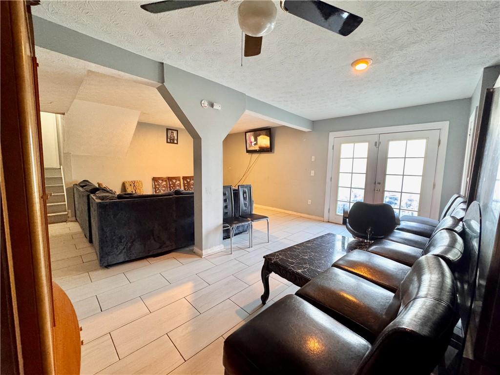 1825 North Road Snellville, GA 30078 - Photo 17 of 43 a living room with furniture and a window