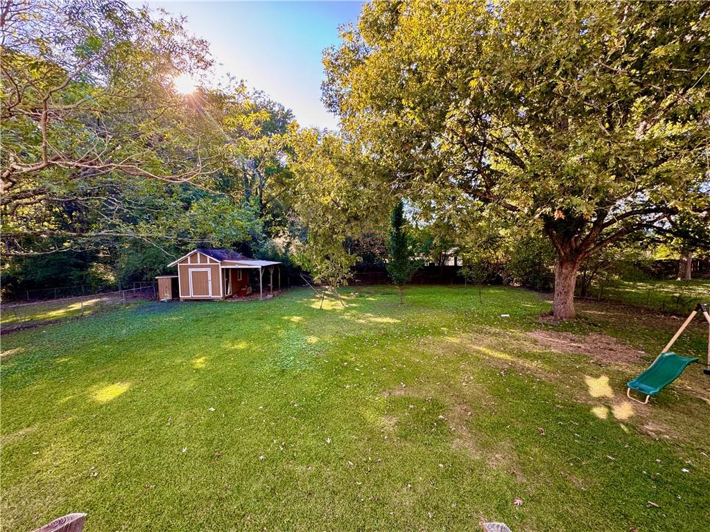 1825 North Road Snellville, GA 30078 - Photo 31 of 43 a view of a house with a yard