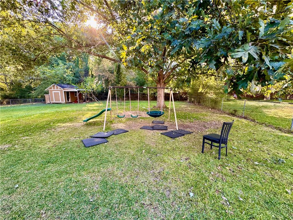 1825 North Road Snellville, GA 30078 - Photo 37 of 43 a view of a park with slide